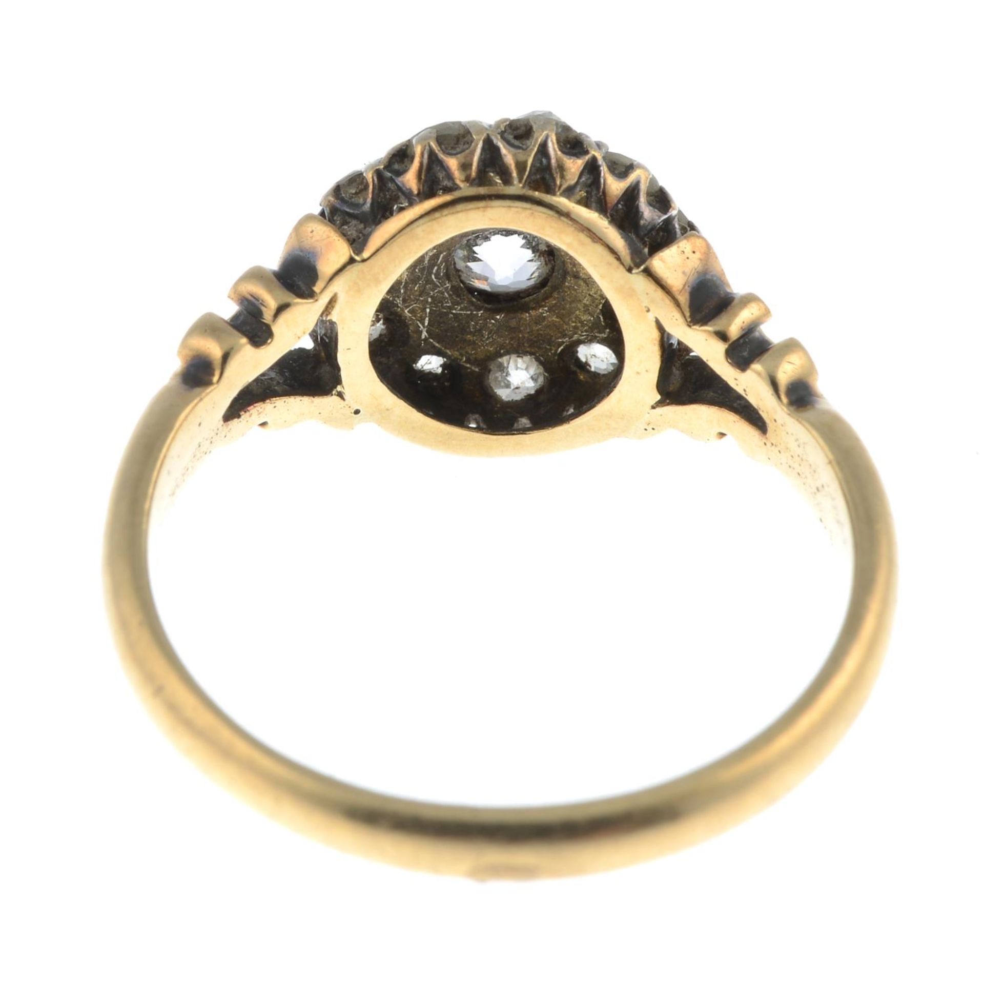 A late 19th century 18ct gold old-cut diamond cluster ring.Estimated total diamond weight 0.70ct, - Bild 2 aus 3