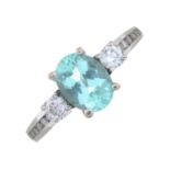 An 18ct gold bluish-green tourmaline and brilliant-cut diamond dress ring.Estimated total diamond