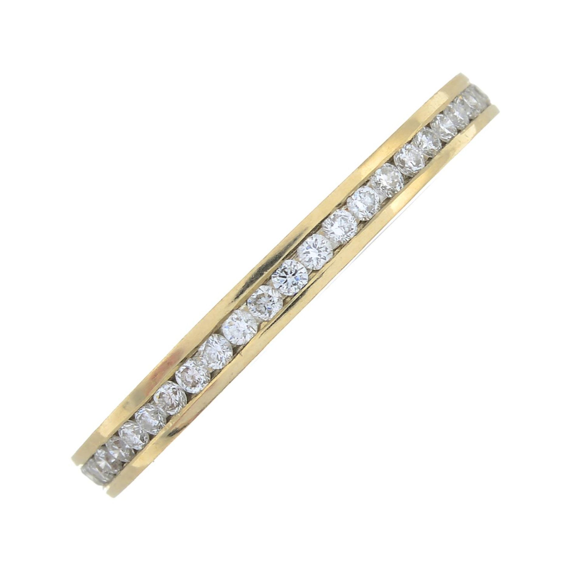 A brilliant-cut diamond full eternity ring.