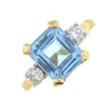 An aquamarine and diamond three-stone ring.Aquamarine calculated weight 2.81cts,