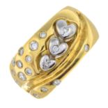 An 18ct bi-colour gold brilliant-cut diamond dress ring.Estimated total diamond weight