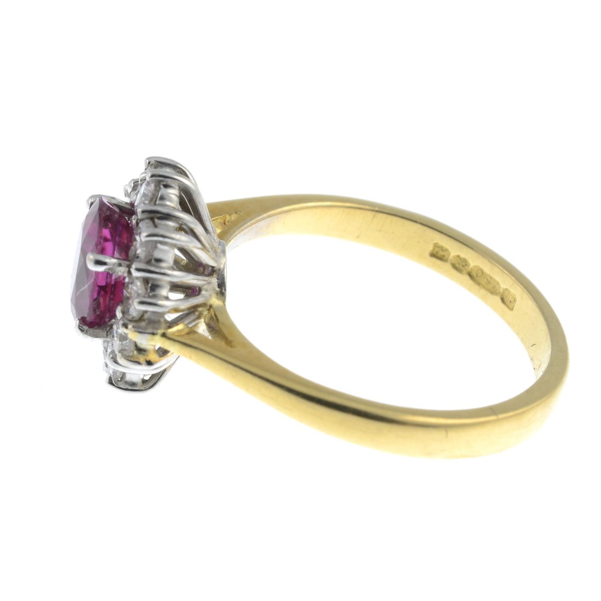 An 18ct gold ruby and brilliant-cut diamond cluster ring.Ruby calculated weight 0.77cts, - Bild 3 aus 3