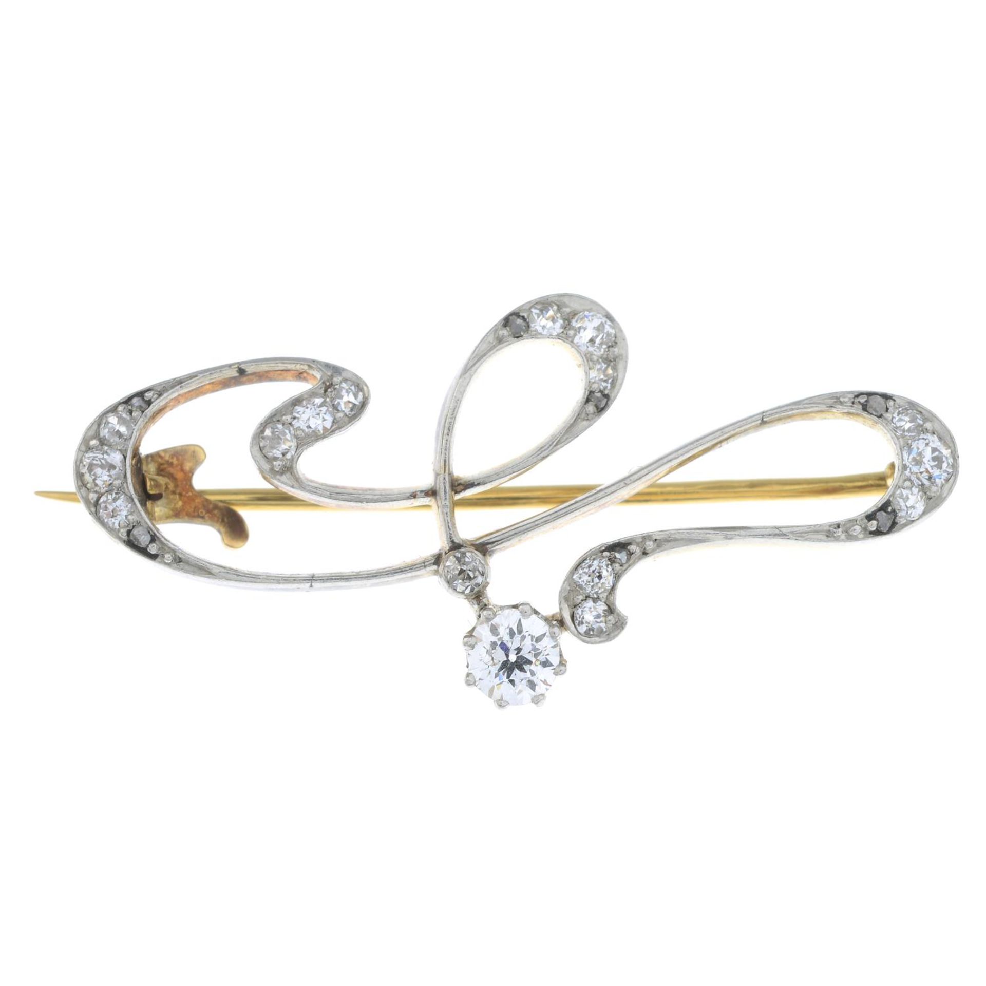 A mid 20th century gold old-cut diamond brooch.Estimated total diamond weight 0.50ct,