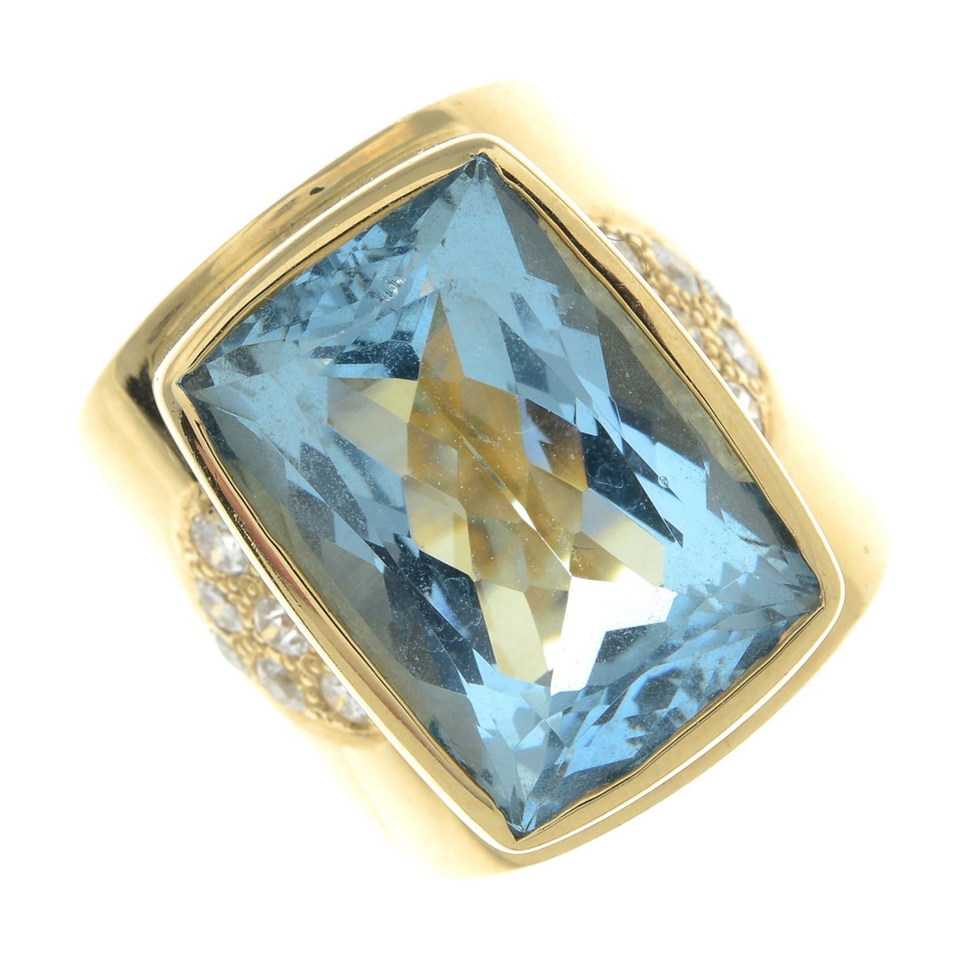 An aquamarine and vari-cut diamond dress ring.Aquamarine calculated weight 11.53cts,