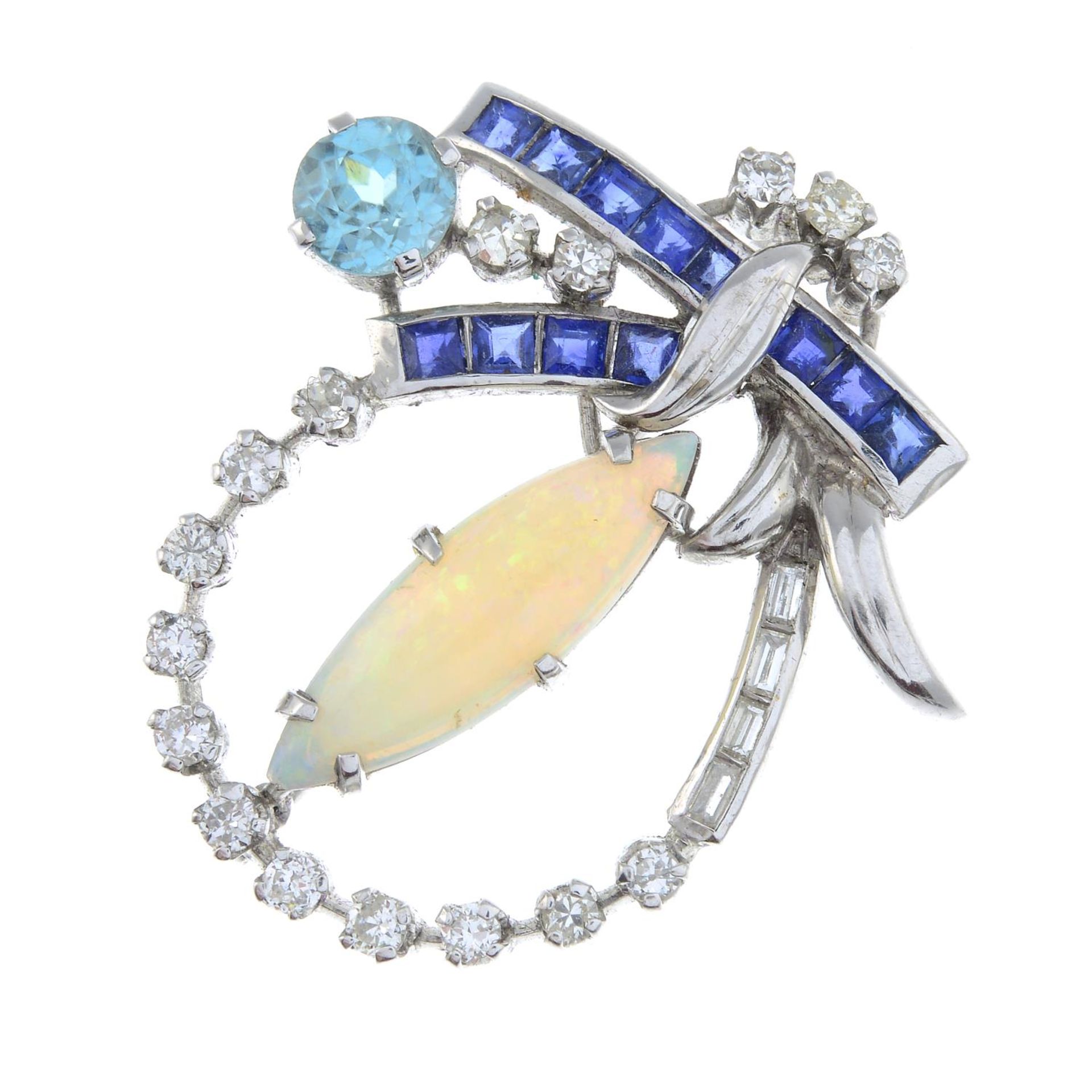 A vari-cut diamond and gem-set brooch.Gems to include opal,