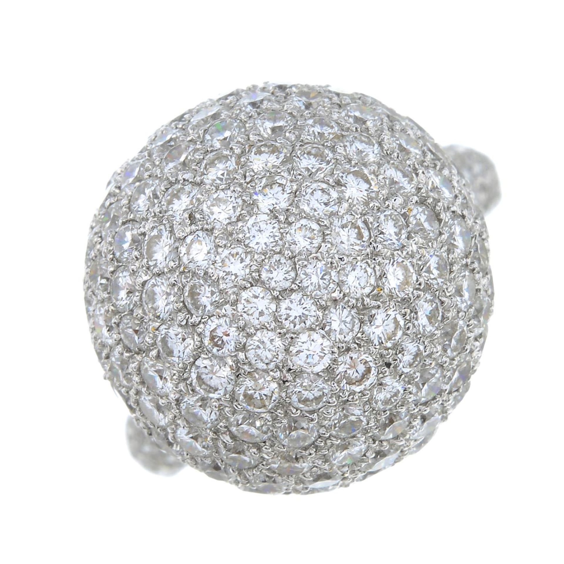 A dress ring, designed as brilliant-cut diamond rotating sphere,