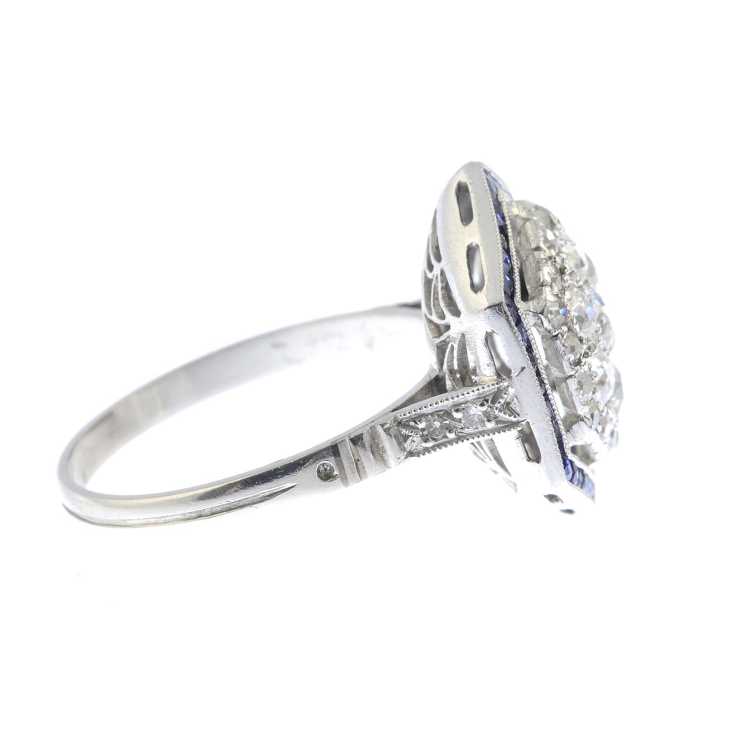 An Art Deco platinum old-cut diamond and calibre-cut sapphire hexagonal cluster ring. - Image 2 of 3