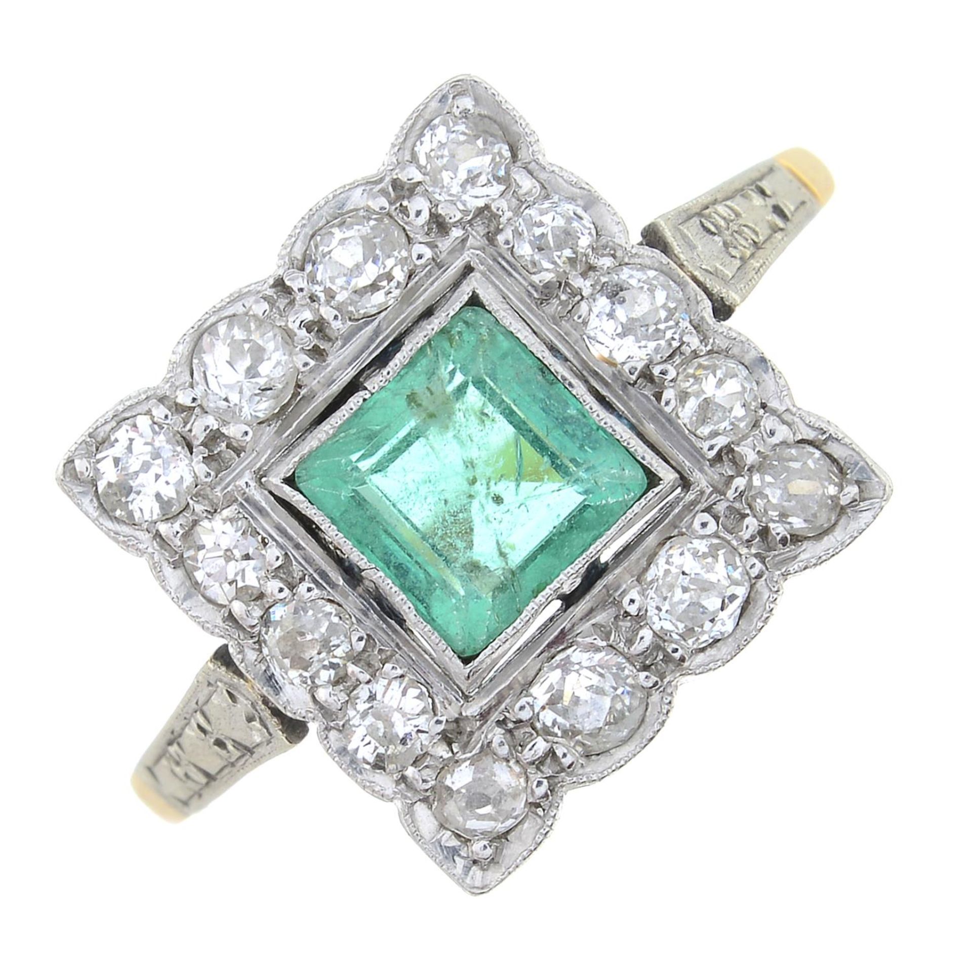 A mid 20th century 18ct gold emerald and old-cut diamond cluster ringCalculated emerald weight