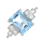 An aquamarine ring with brilliant-cut diamond stepped shoulders.