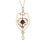 An early 20th century garnet and cultured pearl openwork pendant,