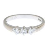 An 18ct gold diamond three-stone ring.Estimated total diamond weight 0.45ct,