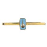 A mid 20th century 18ct gold and enamel tiepin,
