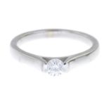 An 18ct gold diamond single-stone ring.Estimated diamond weight 0.25ct,