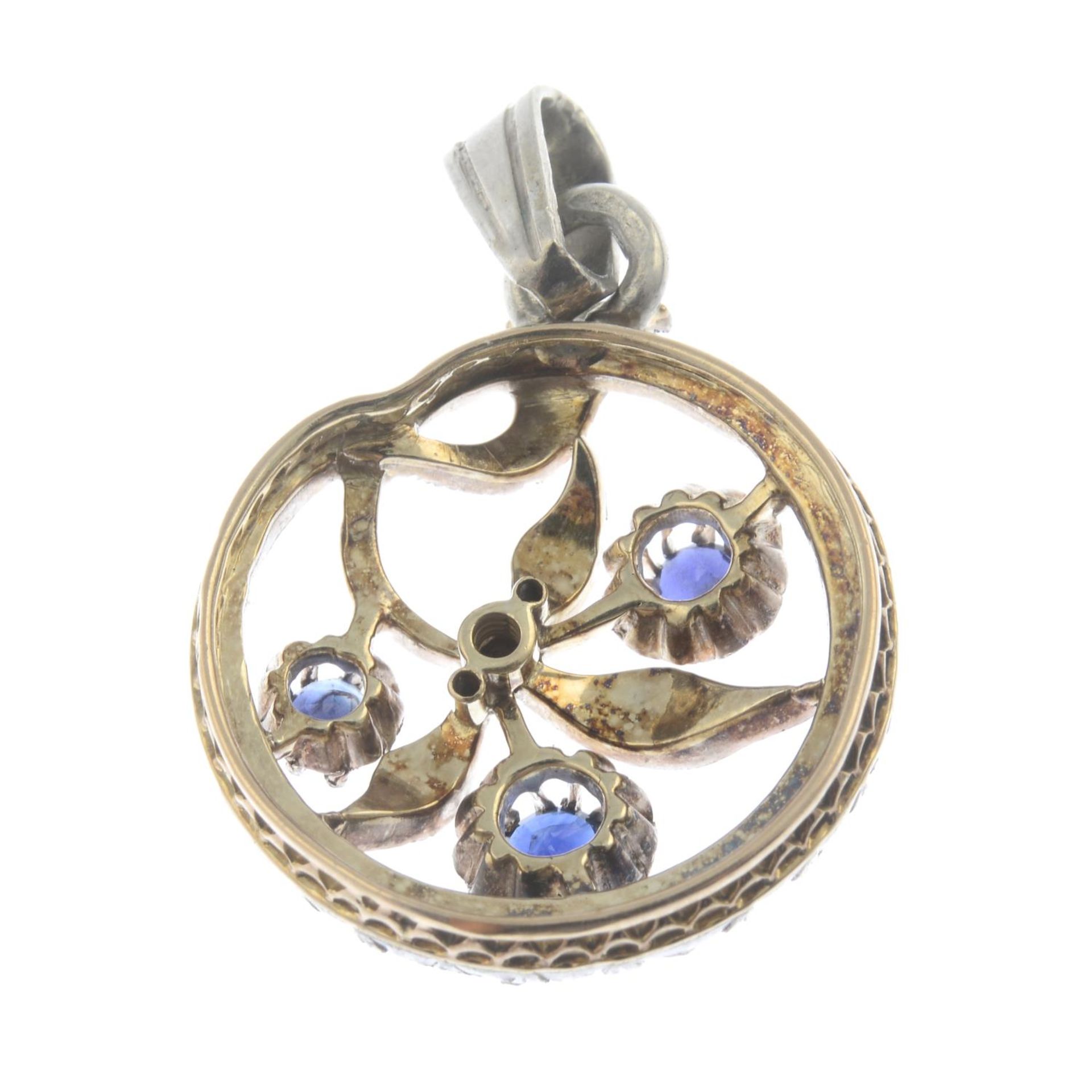 A late 19th century silver and gold sapphire and diamond openwork pendant.Length 3.5cms. - Bild 2 aus 2