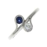 A 9ct gold sapphire and diamond two-stone ring.Estimated diamond weight 0.10ct,