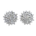 A pair of brilliant-cut diamond cluster earrings.Total diamond weight 0.50ct,