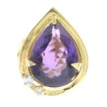 An 18ct gold amethyst and diamond dress ring.Estimated total diamond weight 0.10ct.