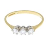 An 18ct gold diamond three-stone ring.Total diamond weight 0.30ct, stamped to band.