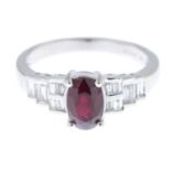 An 18ct gold ruby and diamond ring.Ruby weight 1.24cts.