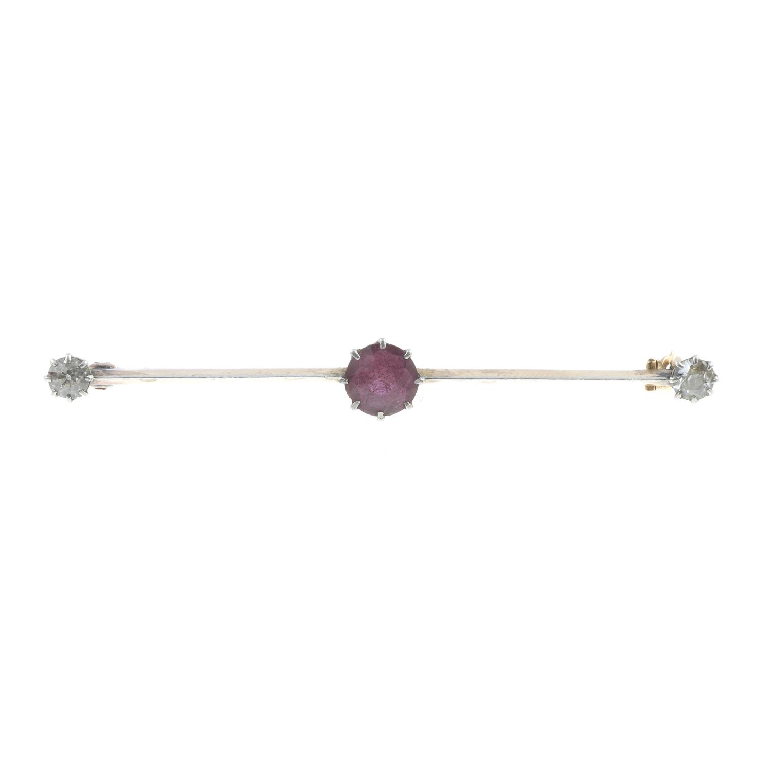 An early 20th century platinum and gold pink tourmaline and diamond bar brooch.Estimated total