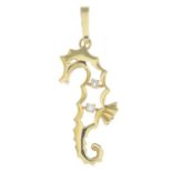 A gold openwork seahorse pendant,