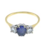 A sapphire and diamond three-stone ring.Estimated total diamond weight 0.40ct,