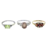 9ct gold peridot ring, with diamond accent shoulders, hallmarks for 9ct gold, ring size O, 1.7gms.