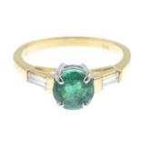 An emerald and diamond three-stone ring.Emerald weight 1.31cts.