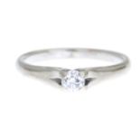 An 18ct gold diamond single-stone ring.Estimated diamond weight 0.25ct,