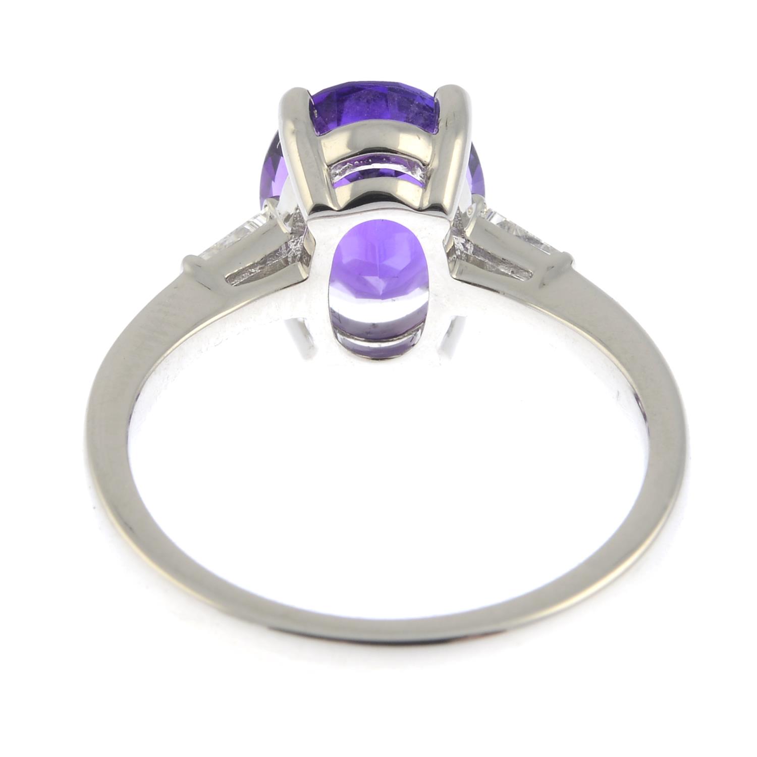 An amethyst and diamond three-stone ring.Estimated total diamond weight 0.10ct. - Image 2 of 3