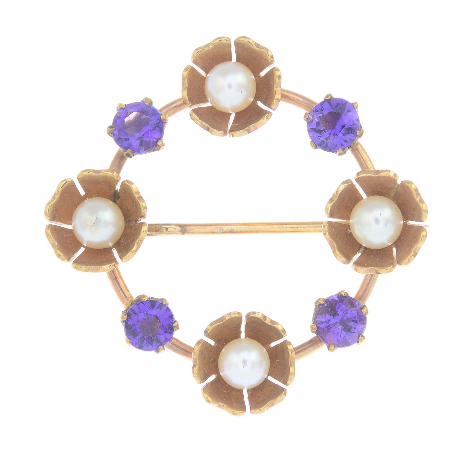 An early 20th century 9ct gold amethyst and cultured pearl wreath brooch.Stamped 9CT.
