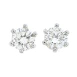 A pair of 18ct gold brilliant-cut diamond stud earrings.Estimated total diamond weight 0.50ct,