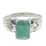 An 18ct gold emerald and diamond ring.Emerald calculated weight 1.81cts,