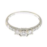 An 18ct gold brilliant-cut diamond dress ring.Total diamond weight 0.50ct,