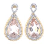 A set of morganite and diamond jewellery, comprising a pair of earrings and a pendant.