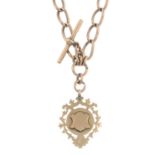 An early 20th century 9ct gold Albert, with T-bar, lobster claps and medallion fob.