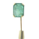 An early 20th century emerald stickpin.Length of stickpin head 1.2cms.