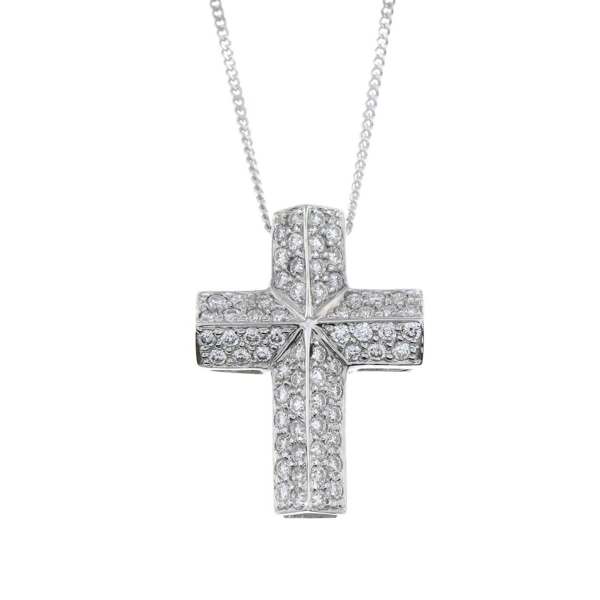 A brilliant-cut diamond cross pendant, with 9ct gold chain.