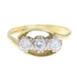 An 18ct gold brilliant-cut diamond three-stone ring.Estimated total diamond weight 0.45ct,