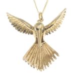 A pendant, depicting a textured hummingbird in flight, with 9ct gold chain.