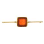 A carnelian intaglio seal bar brooch.