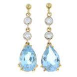A pair of topaz and brilliant-cut diamond drop earrings.Estimated total diamond weight 0.30ct,