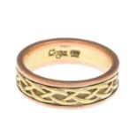 A 9ct gold bi-colour band ring, by Clogau.Signed Clogau.