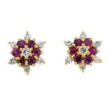 A pair of 18ct gold ruby and brilliant-cut diamond cluster stud earrings.Estimated total diamond