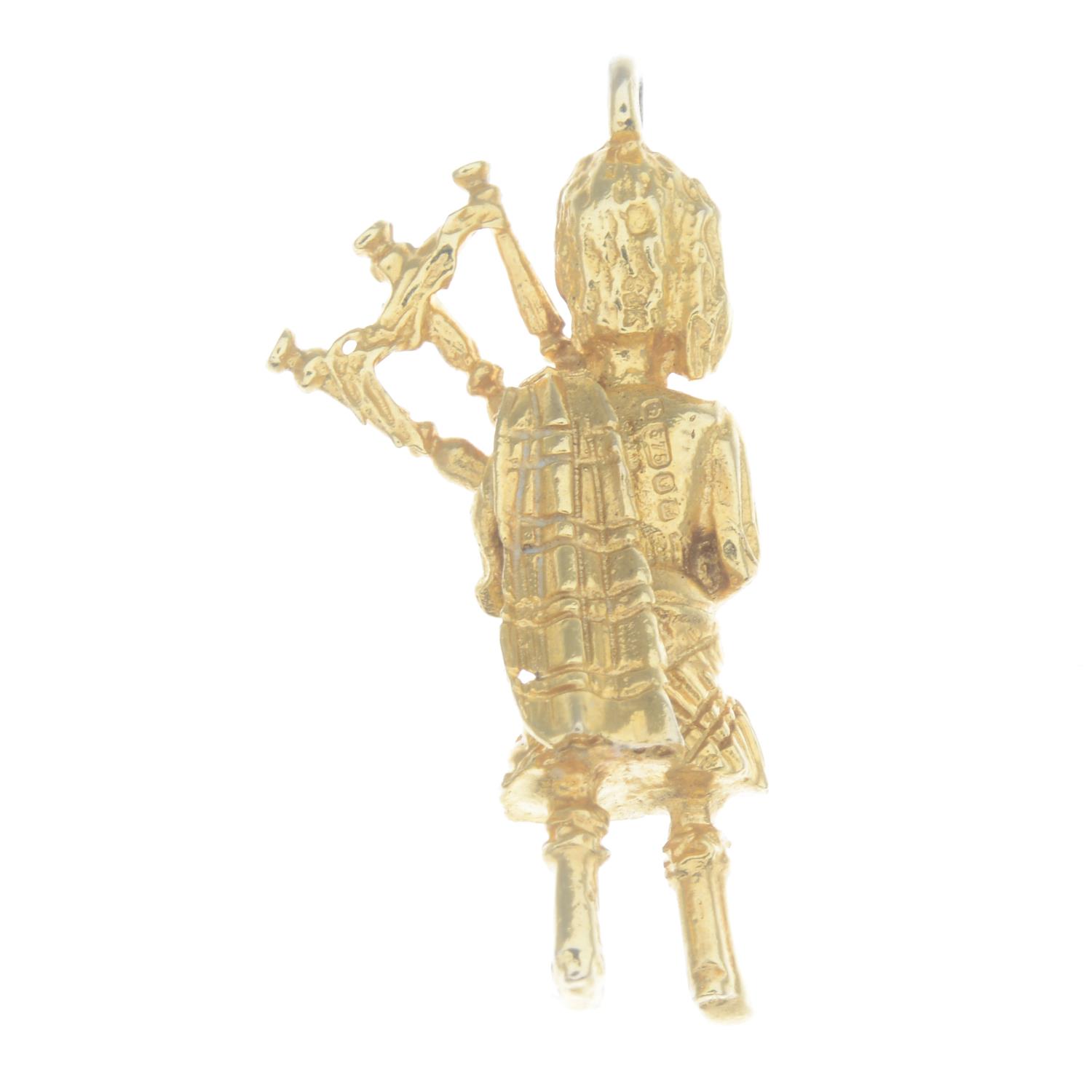 A 1970s 9ct gold Scottish bagpiper charm.Hallmarks for London, 1975. - Image 2 of 2