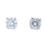 A pair of 9ct gold diamond stud earrings.Estimated total diamond weight 0.45ct,