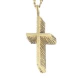 A textured cross pendant,