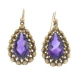 A pair of amethyst drop earrings.Length 3.2cms.