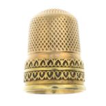 A thimble.Length 2cms.