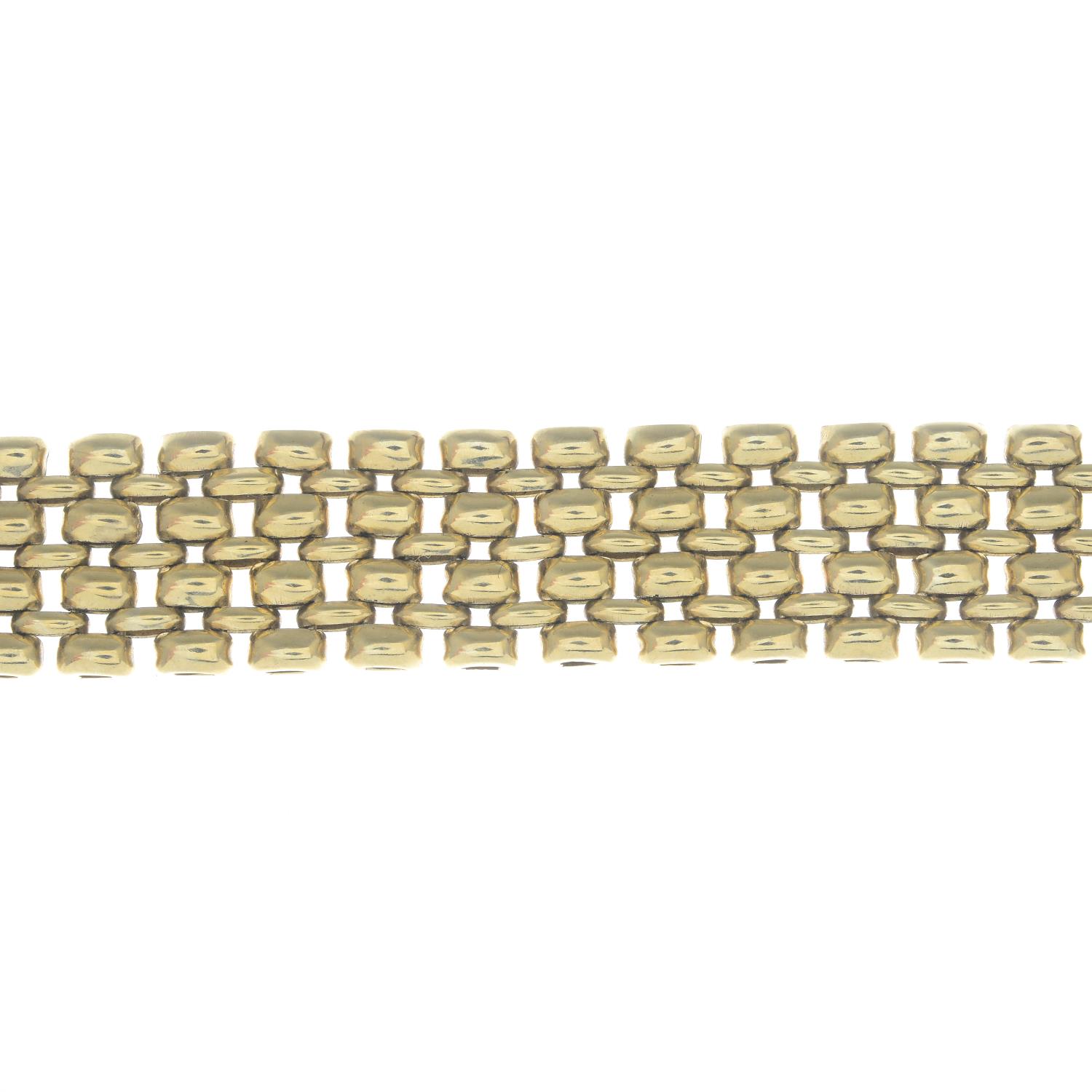 A 9ct gold fancy-link bracelet.Import marks for Sheffield, 1988.Length 20cms.